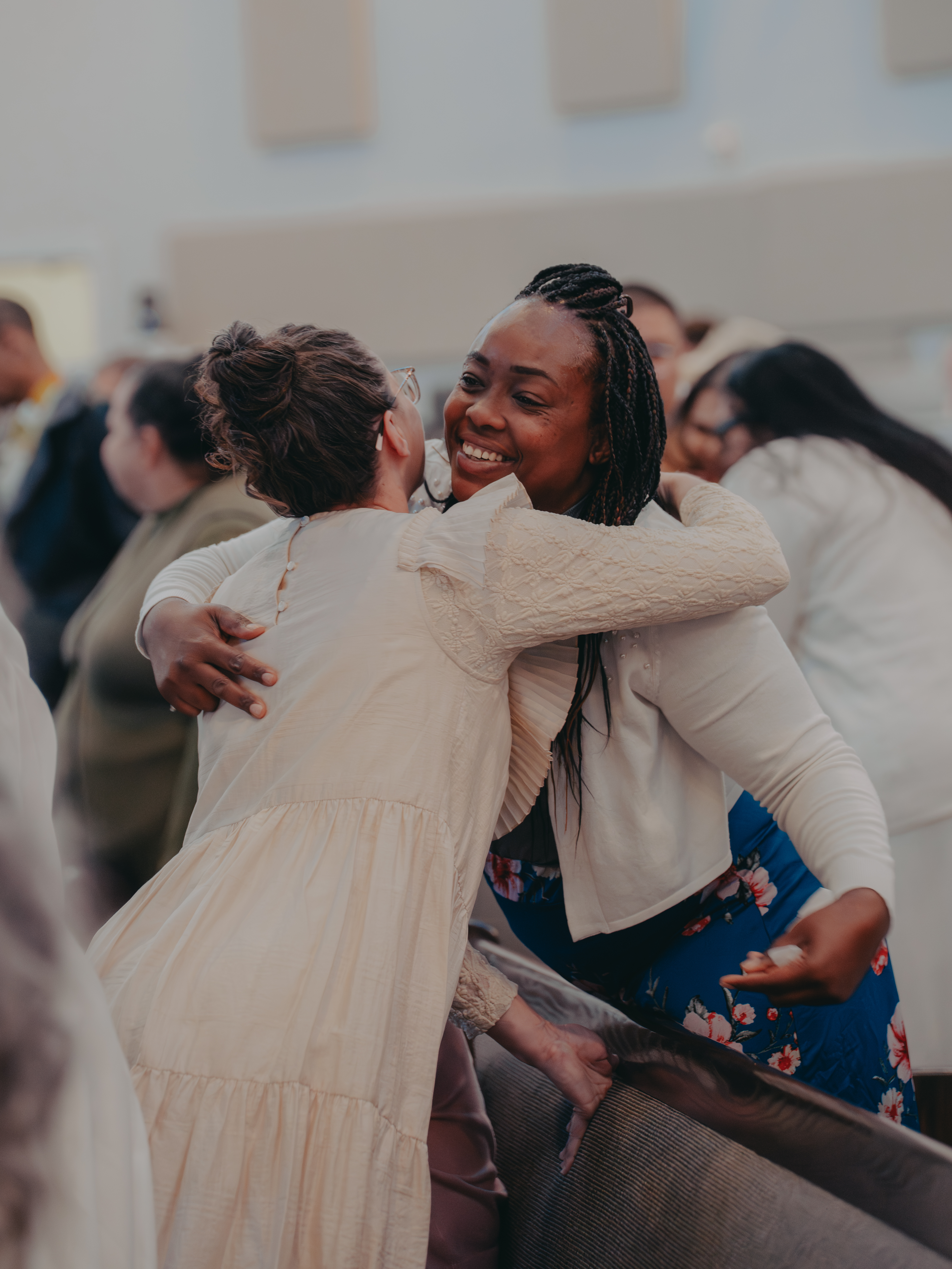 Members of GBFPC embracing and connecting